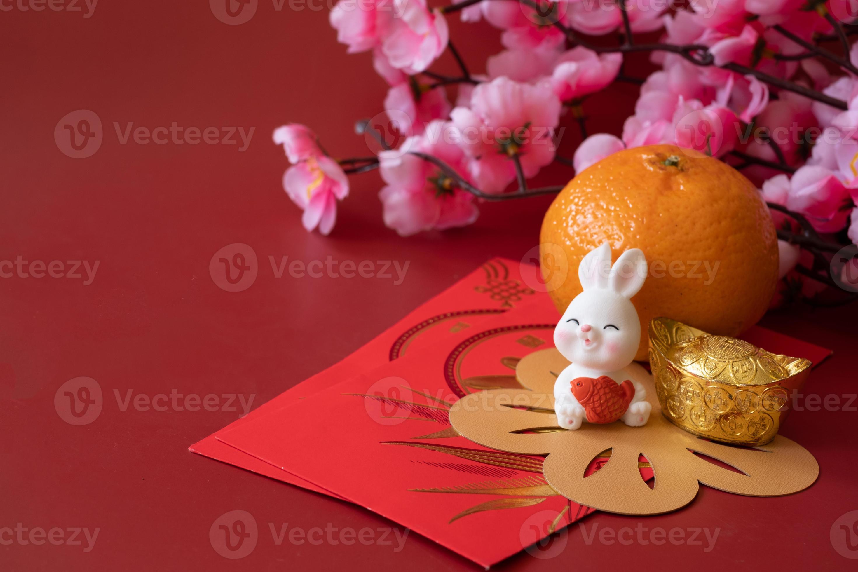 Chinese New Year of the rabbit festival concept. Mandarin orange, red