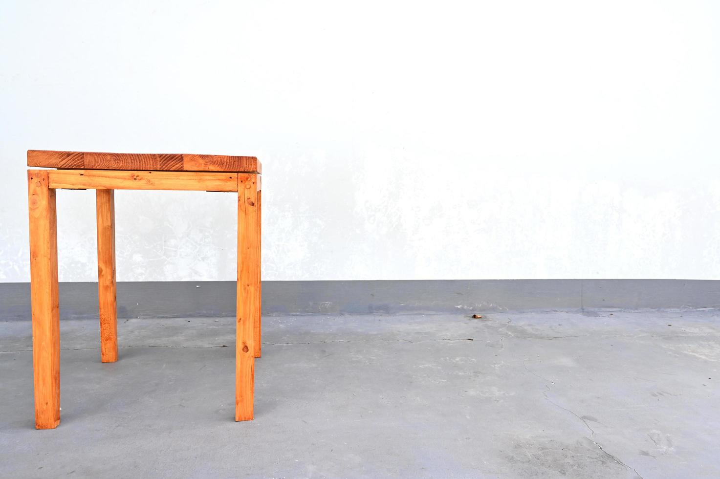 Wooden stool on white background photo