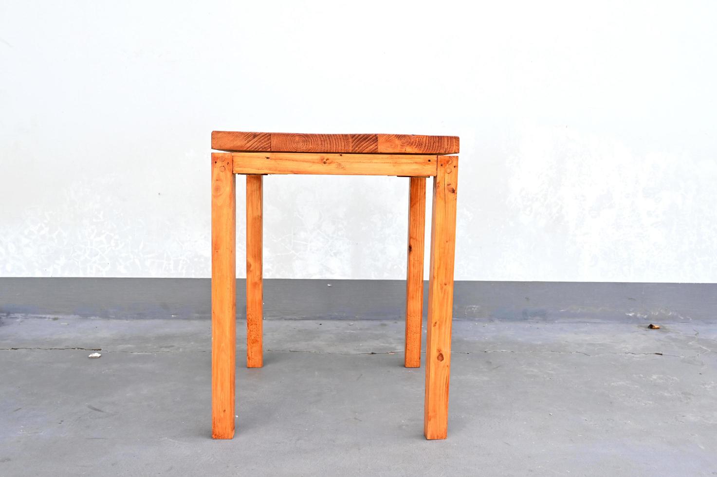 Wooden stool on white background photo