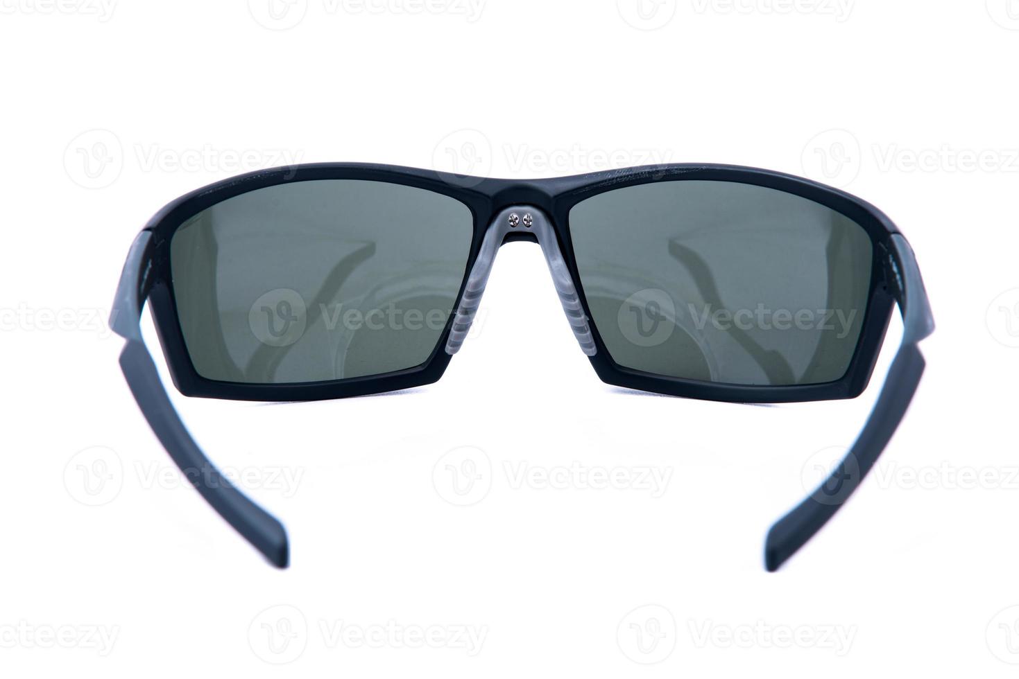 Fashion sunglasses black frames on white background. photo