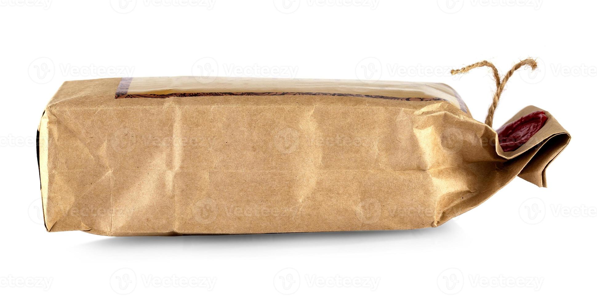 The paper bag with a wax seal isolated on white background photo
