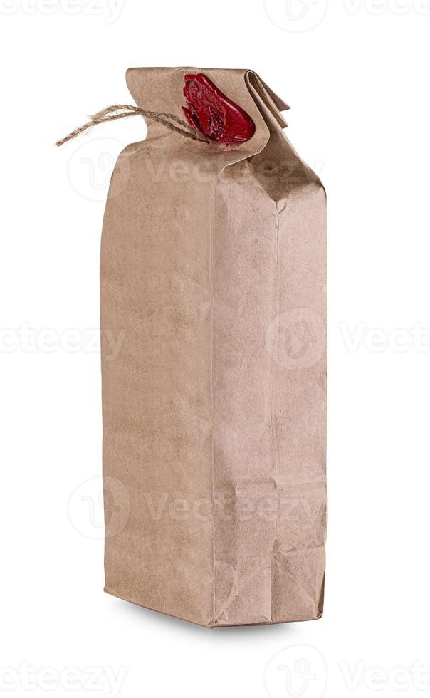 brown paper bag closed wax seal isolated on white background photo