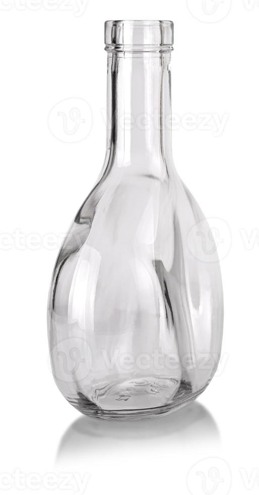 empty clear cognac bottle isolated on white background photo