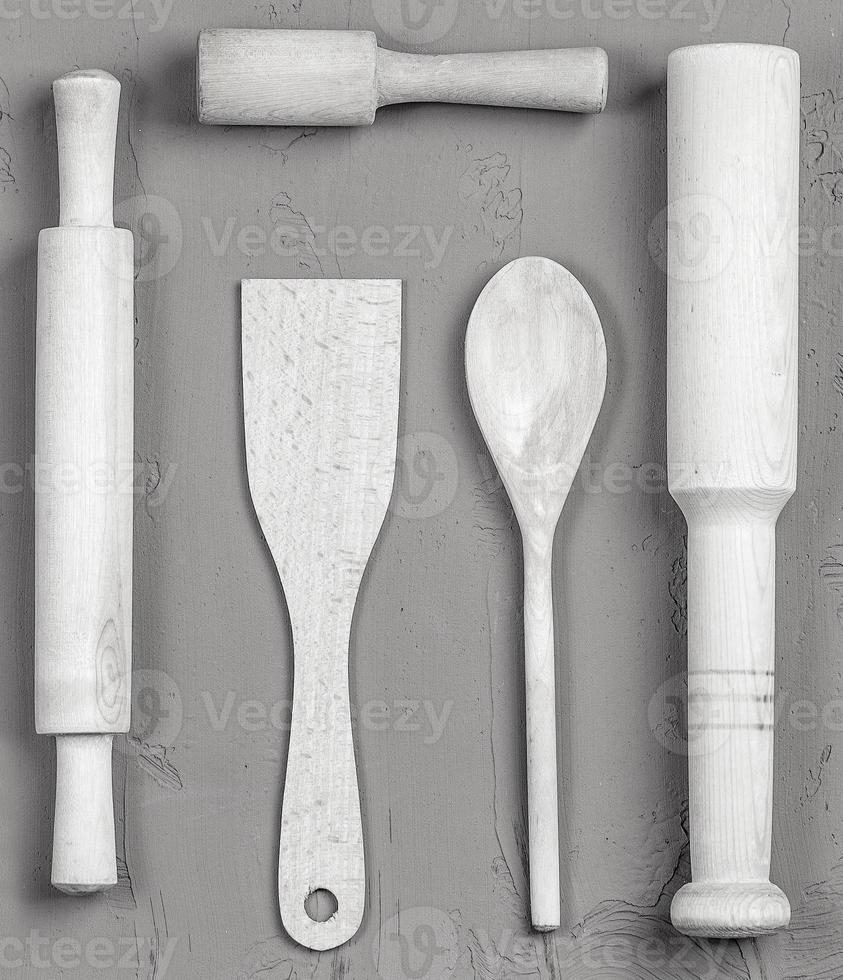 wooden spoons, spatulas and a rolling pin. Close up photo