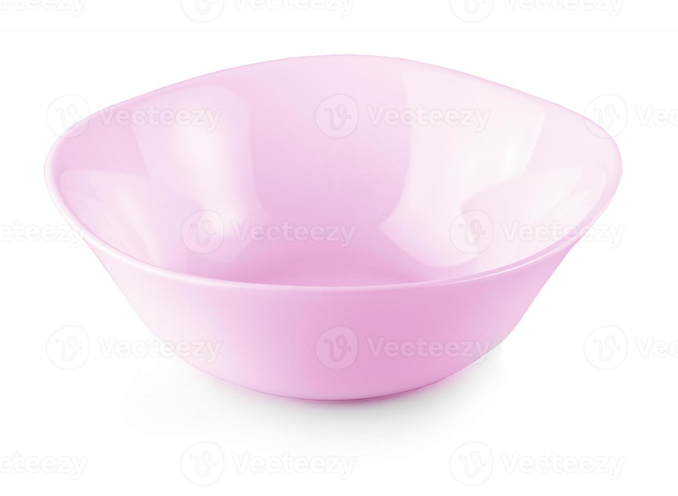 nuevo plato rosa aislado en un fondo blanco foto