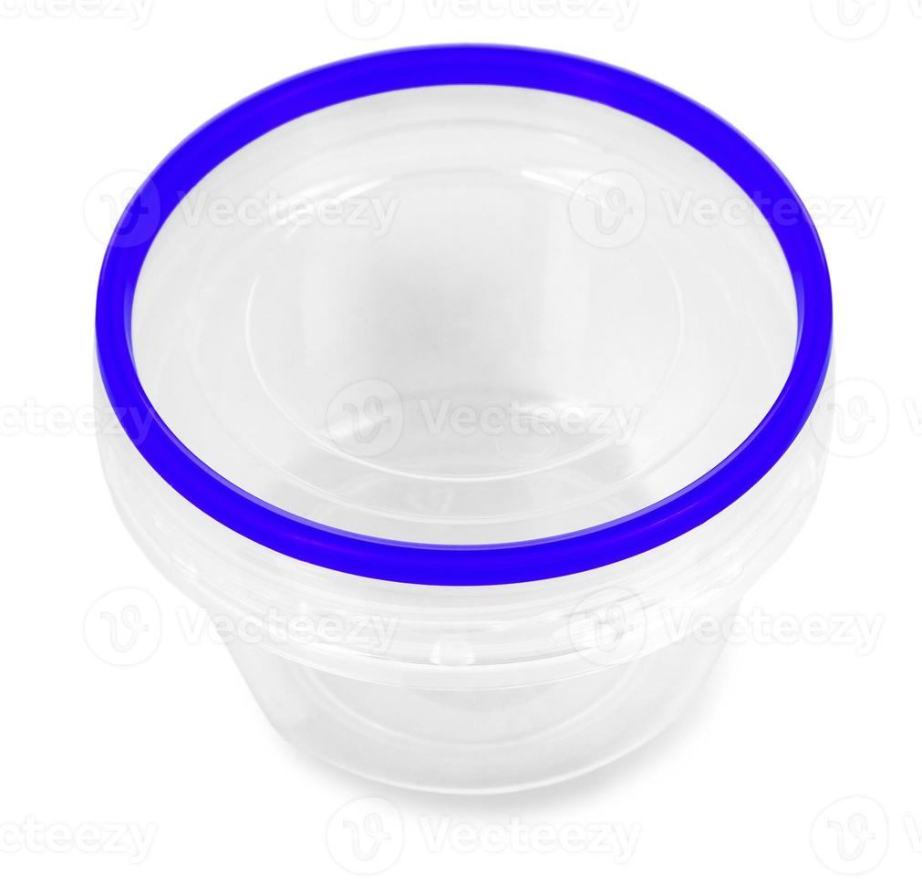 Transparent plastic food container with blue cap. Catering food packaging. photo