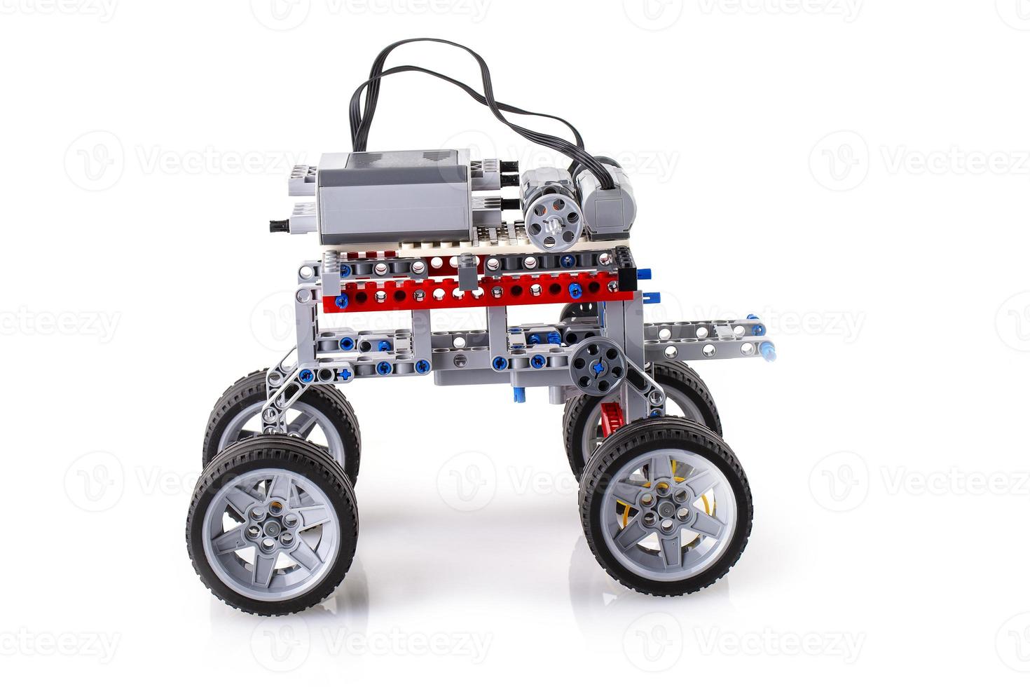 remote control robot made from building blocks assembled by children photo