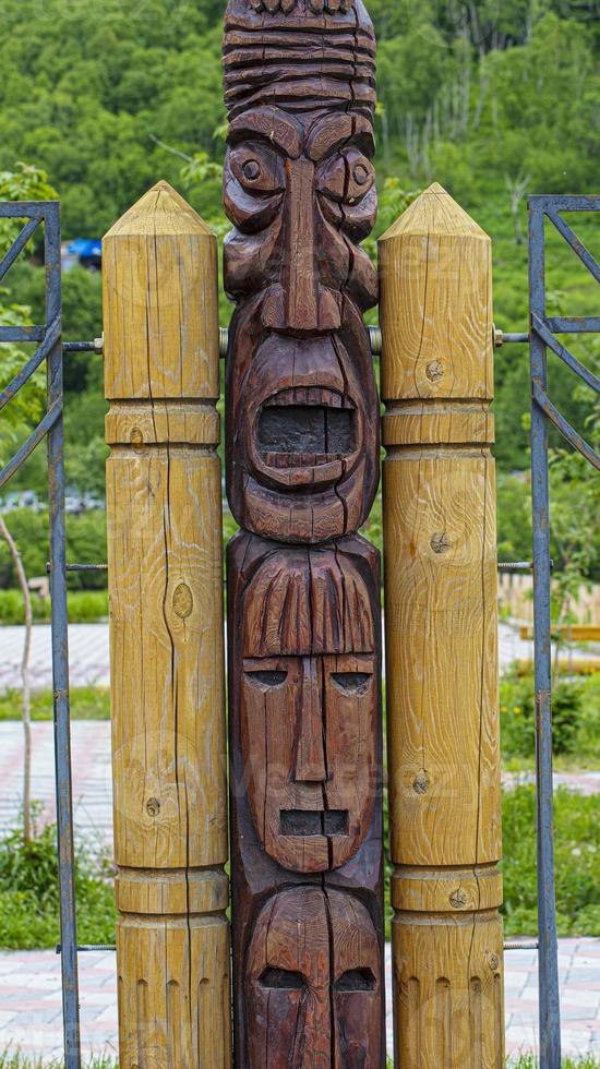 wooden idol statue of koryak on Kamchatka peninsula photo