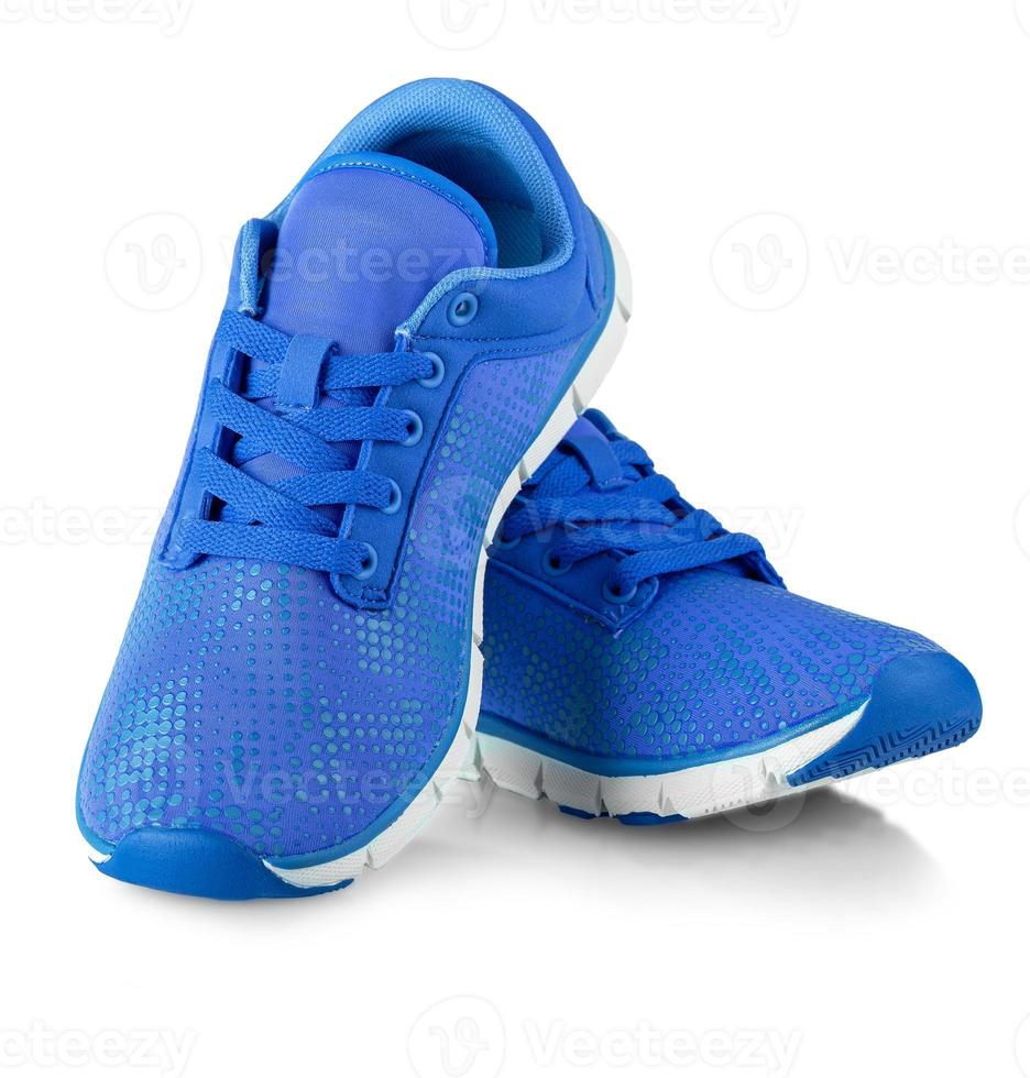 Pair of blue fashions women sneakers isolated on white photo