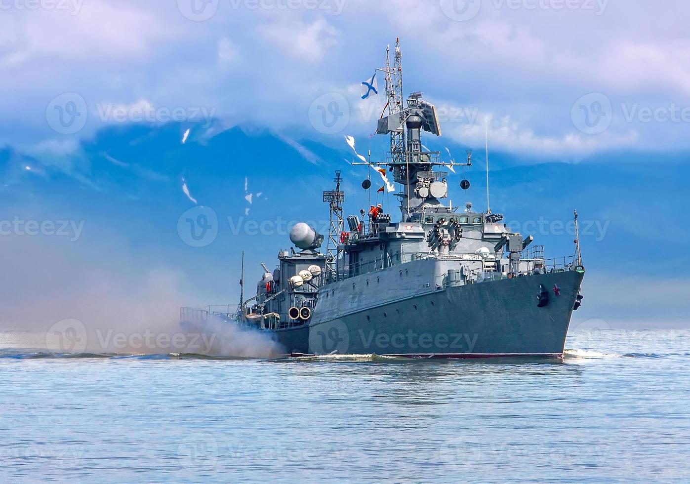 Russian warship going along the coast. Selective focus photo