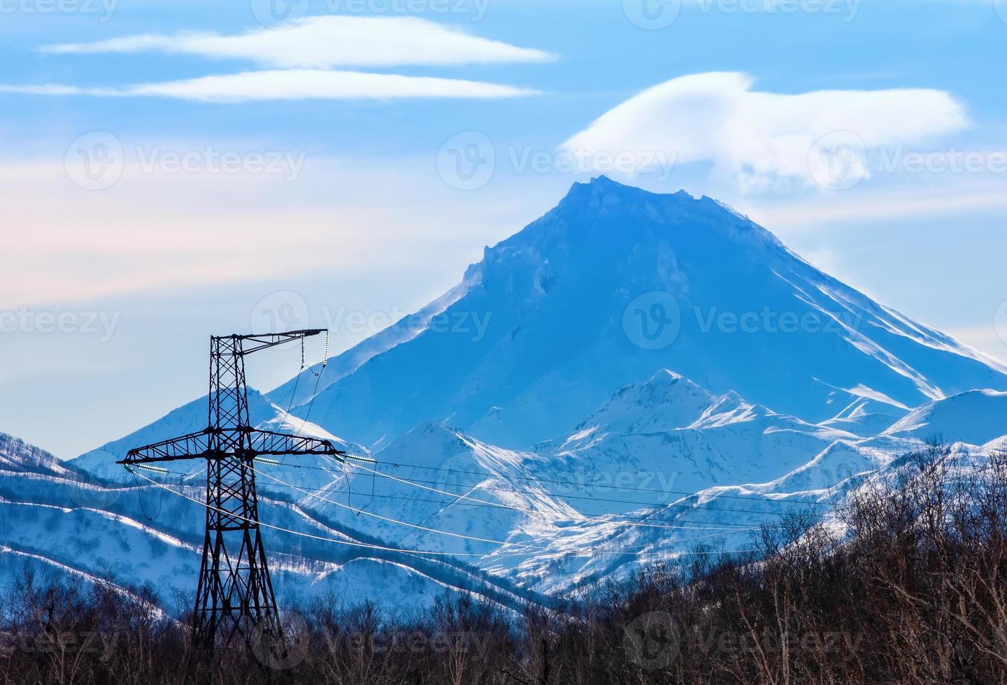 Vilyuchinsky volcano on Kamchatka and High voltage power line photo