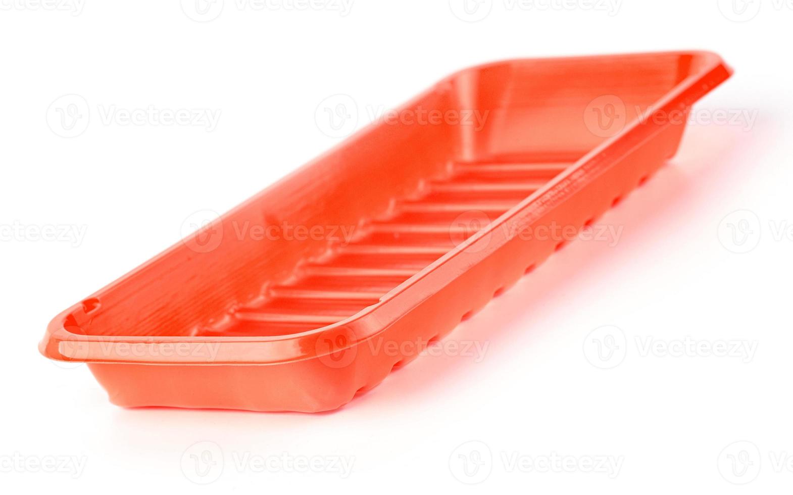 Red plastic tableware food container isolated over the white background photo