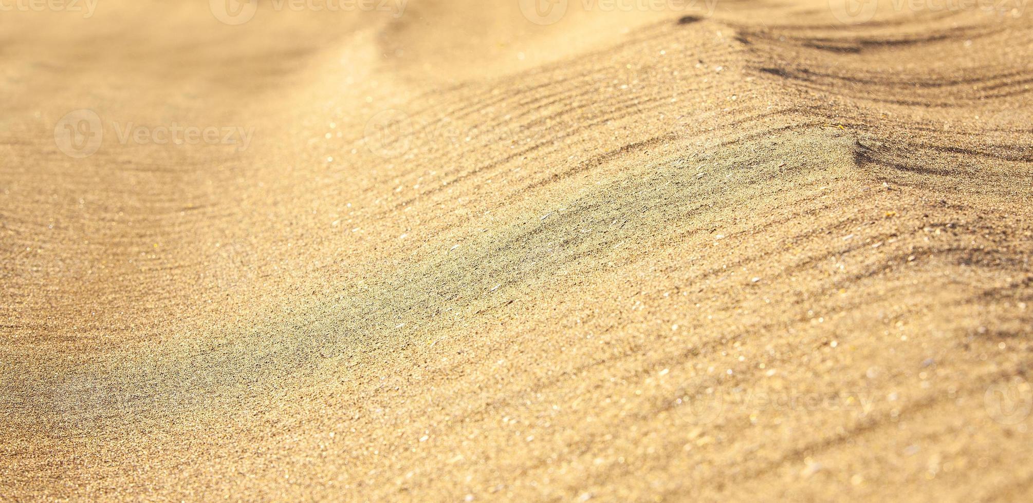 primer plano de arena amarilla como textura. enfoque selectivo foto