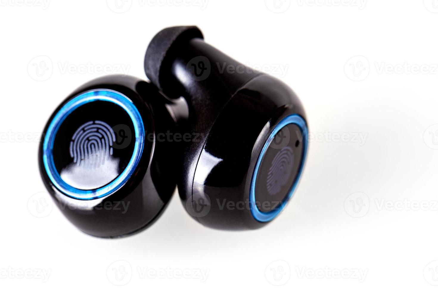 Wireless headphones on a white background. Wireless headset closeup isolated on white background. photo