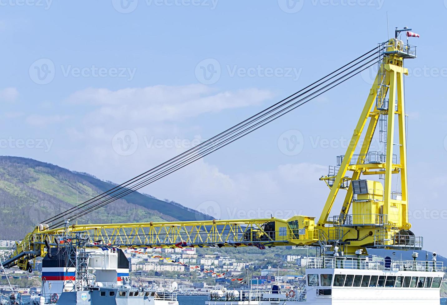 vessel with a crane at the port in Kamchatka Peninsula photo