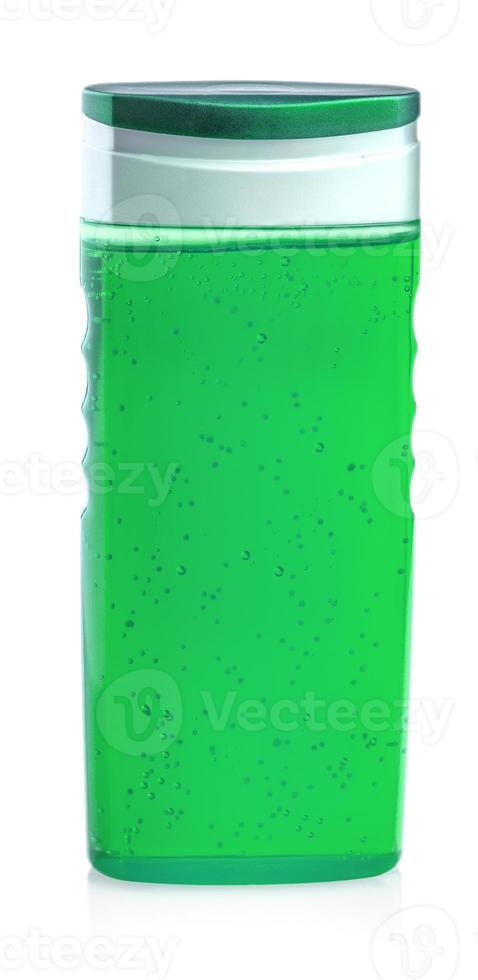 green shampoo bottle isolated on white background photo