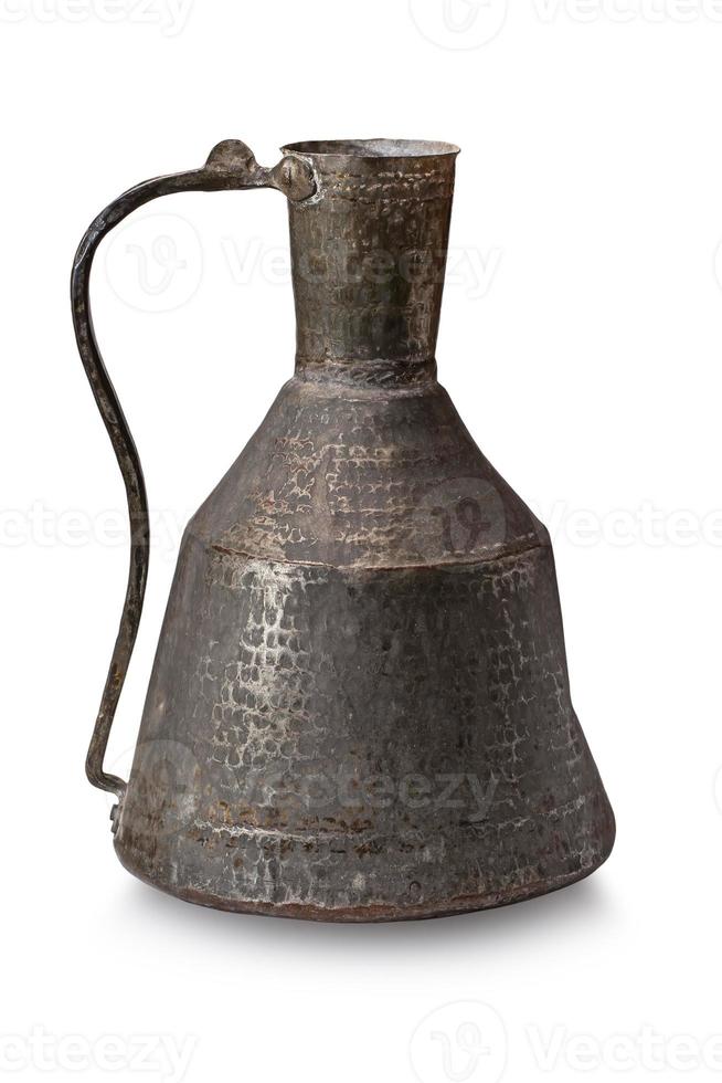 Old vintage copper jug isolated on a white background photo
