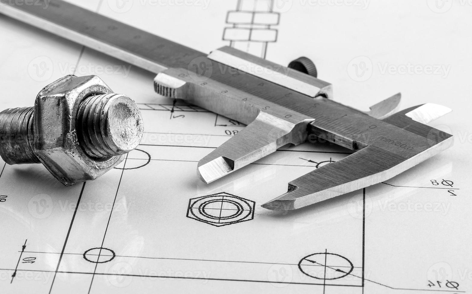 Measuring and drawing instruments and old drawings photo