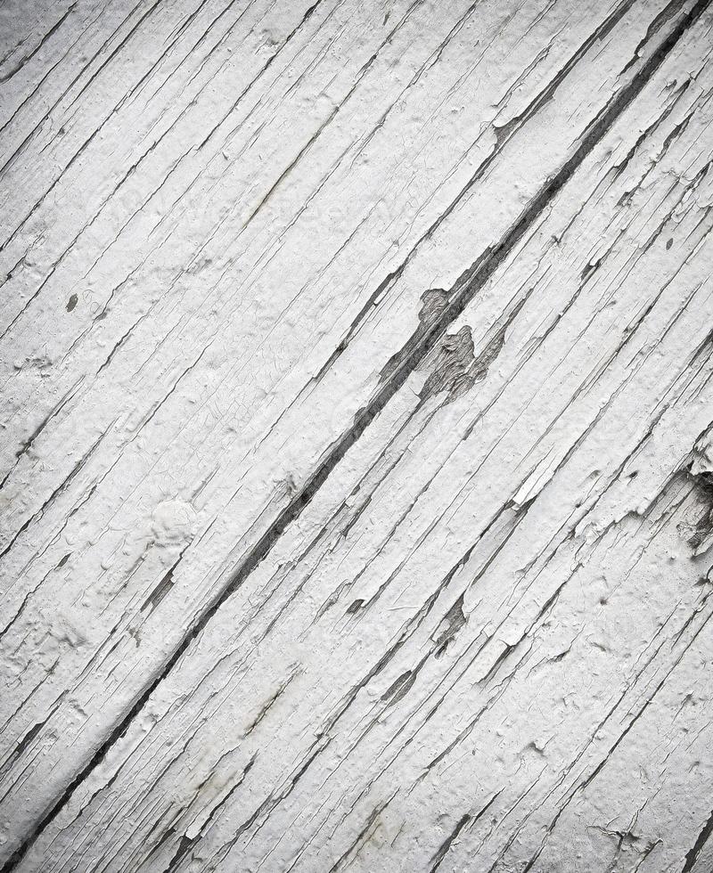 primer plano de tablas de madera pintadas de textura blanca. enfoque selectivo foto