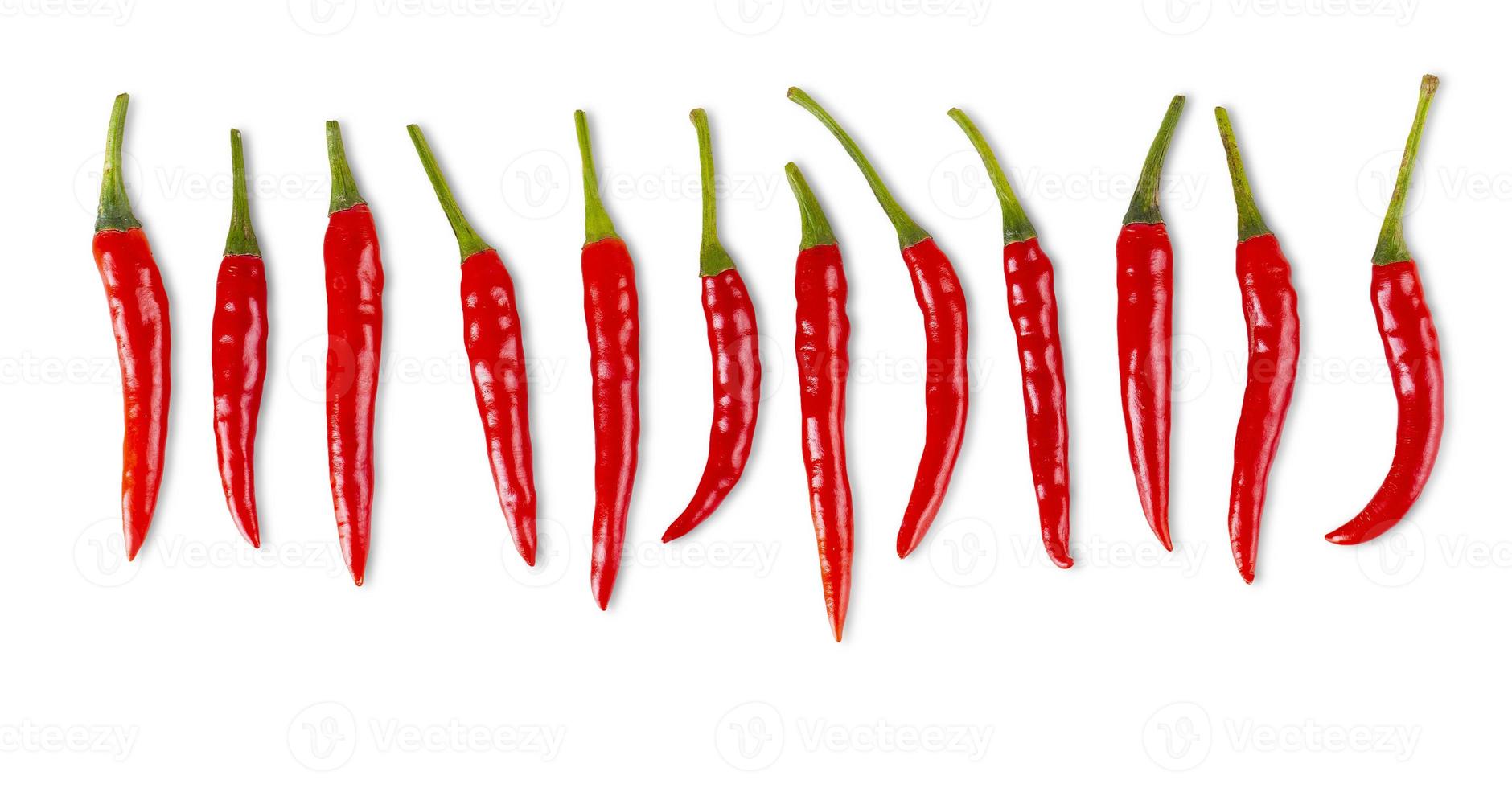 number of red chili peppers isolated on white photo