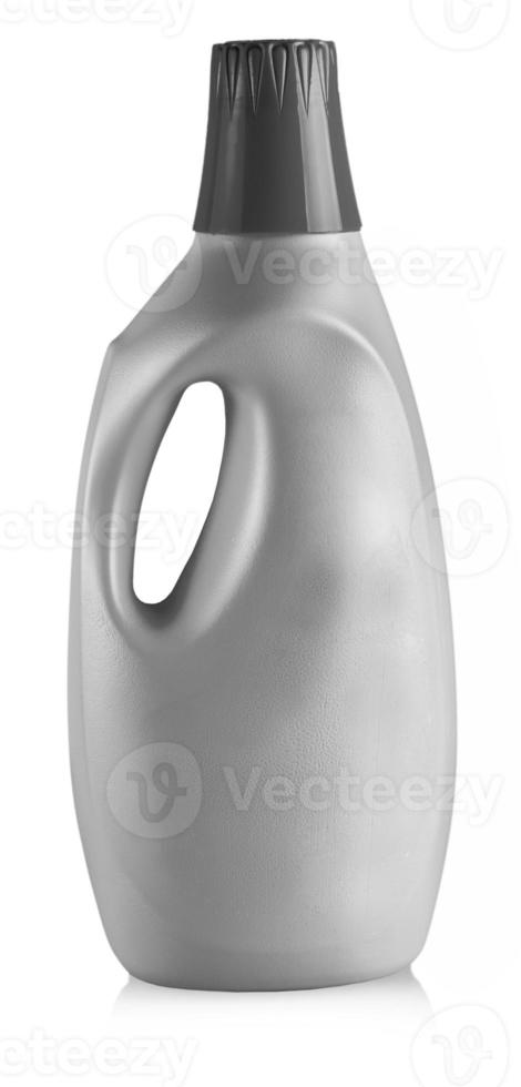 The plastic bottle with household chemicals on a white background photo