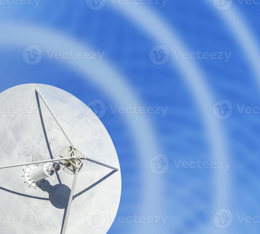 new white locator antenna on blue wave background. photo