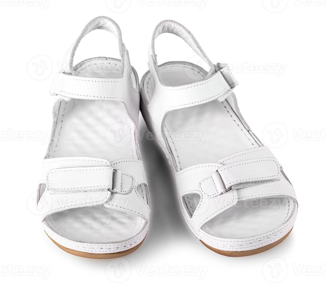 Beautiful photo of female leather sandals isolated on white background.