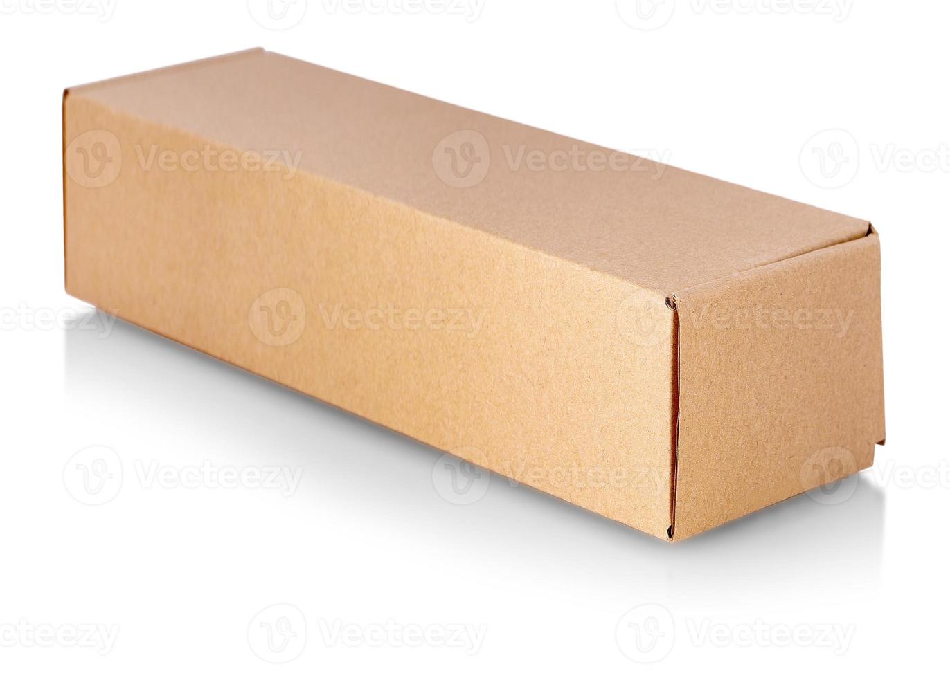 close up cardboard box taped up and isolated on a white background. photo