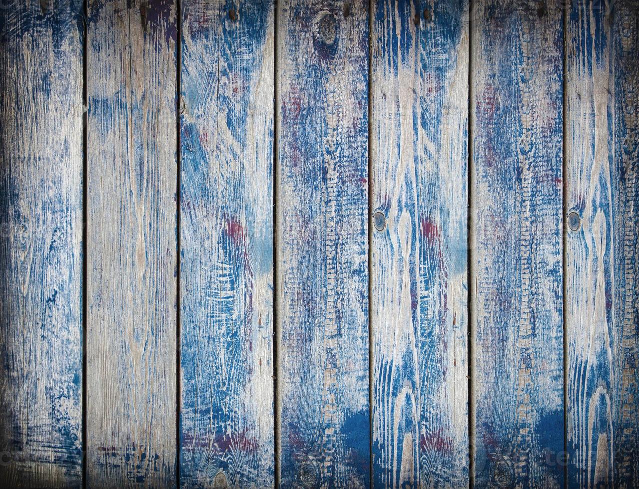 tableros azules oscuros de madera vintage. vista frontal con espacio de copia. foto