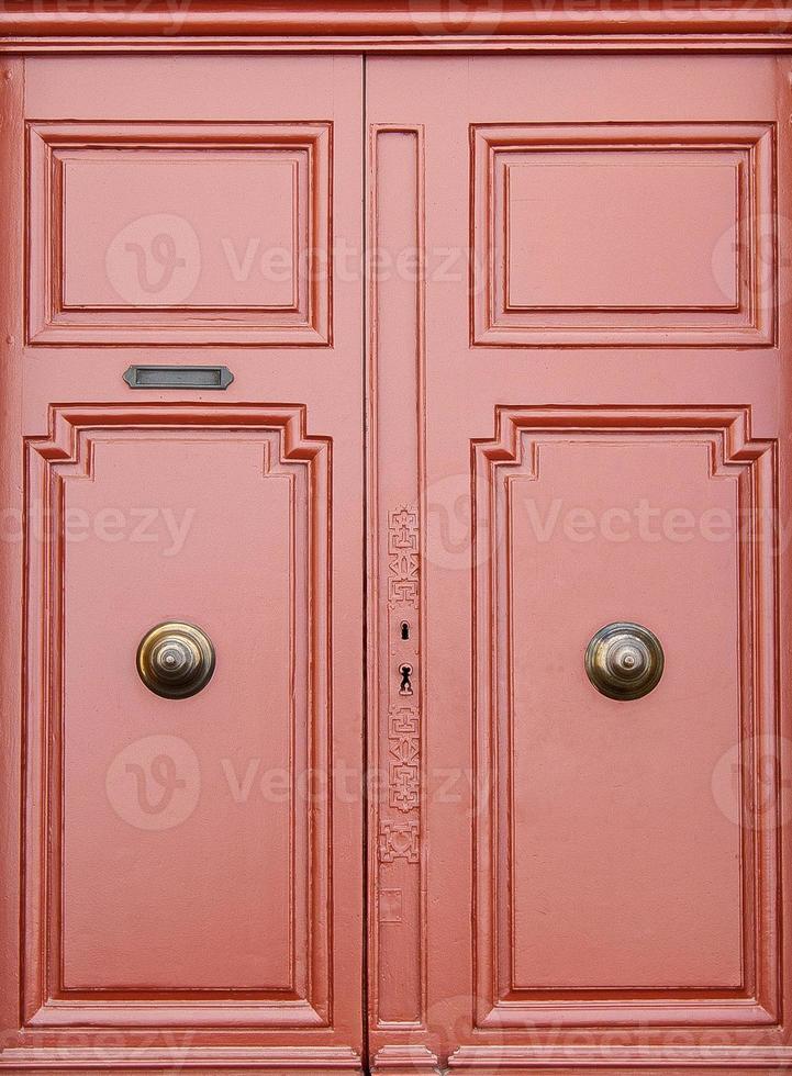 close up ancient wooden door in France. Selective focus photo