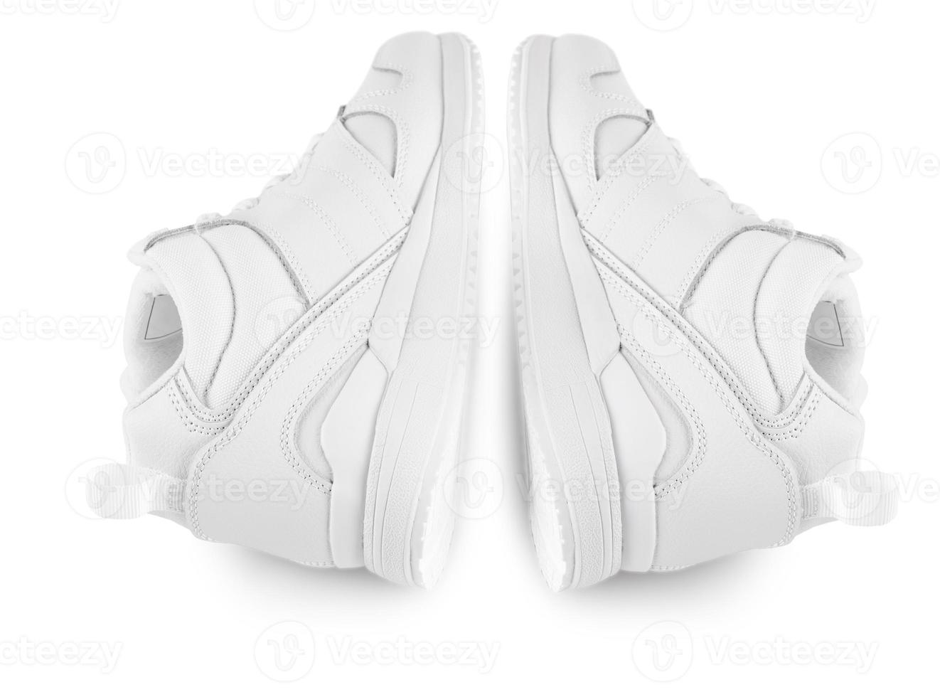 white women's winter sneakers isolated on white. Pair of trendy women photo