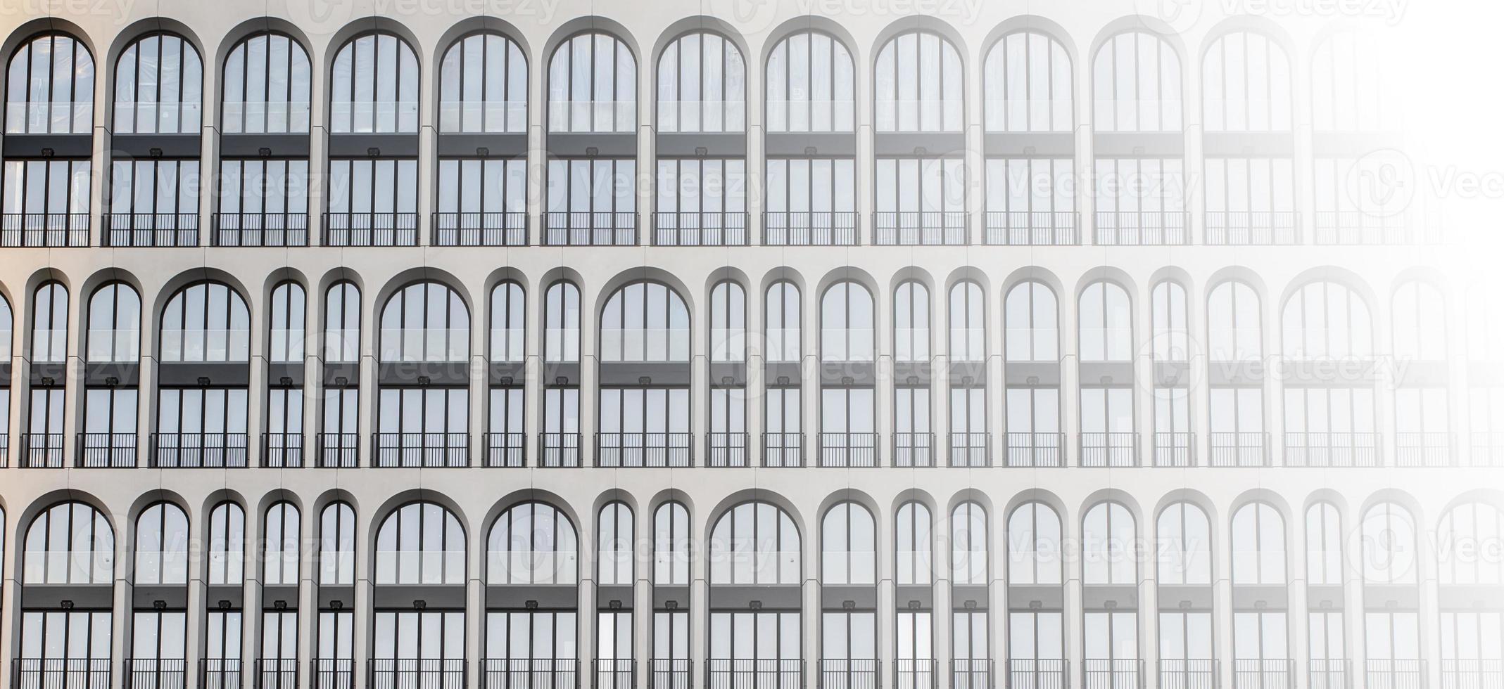 windows in an apartment building as a texture photo