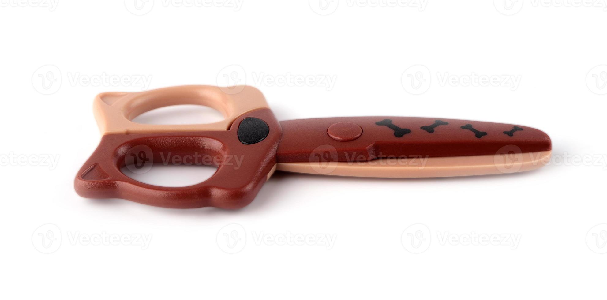 baby scissors with plastic handle isolated on white background photo