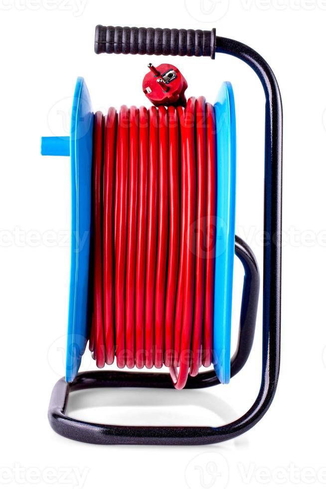 Electric extension reel, red Rubber gloves Isolated on white background. photo