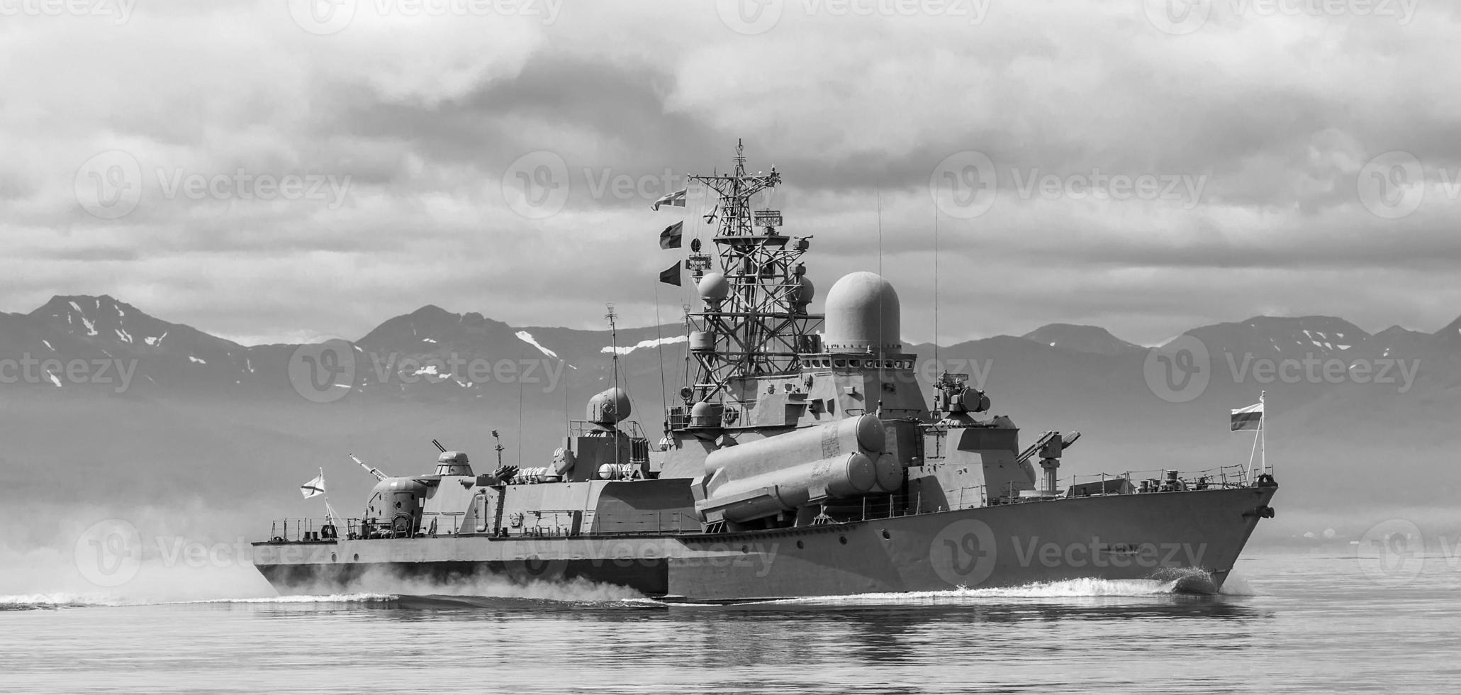 Russian warship going along the coast of Kamchatka photo