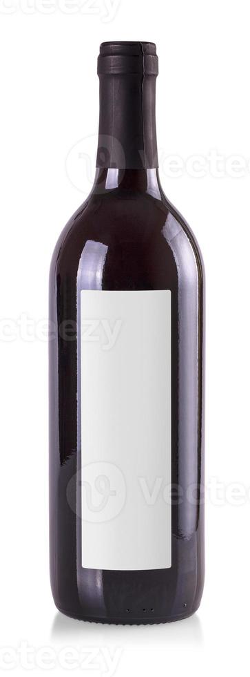 Red wine bottle, with real paper blank label. Isolated on white. photo