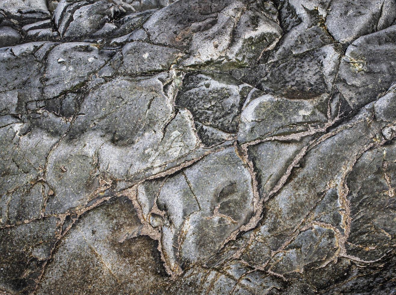 Dark grey black stone background or texture. Selective focus photo