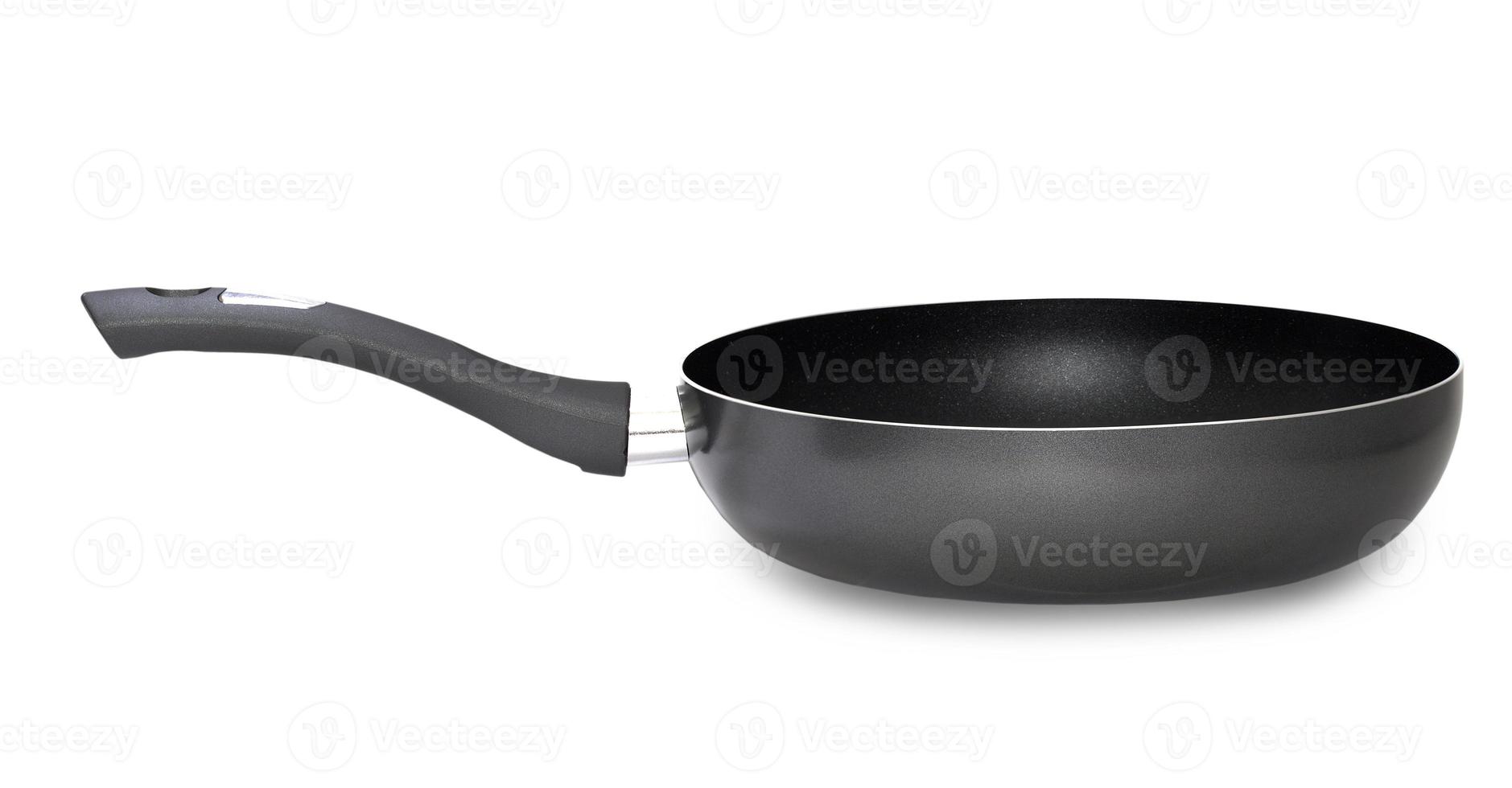 black fry pan over white background photo