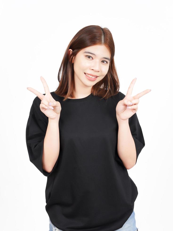 Showing Peace Sign and Smile Of Beautiful Asian Woman Isolated On White Background photo