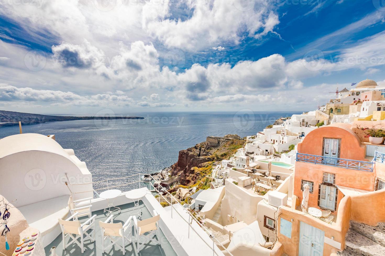 White architecture on Santorini island, Greece. Beautiful summer landscape, sea view. Oia village, amazing scenery and vacation mood, wonderful holiday concept. Idyllic travel background photo