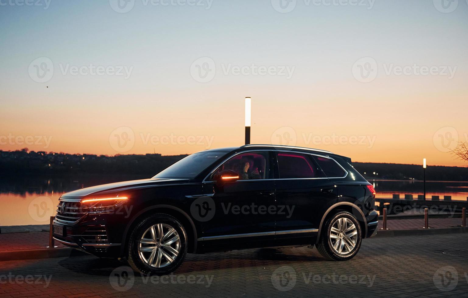 Car by the sunset photo