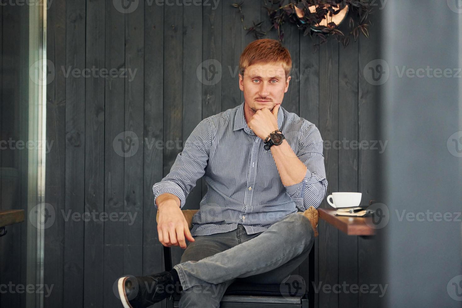 Businessman on the coffee shop photo