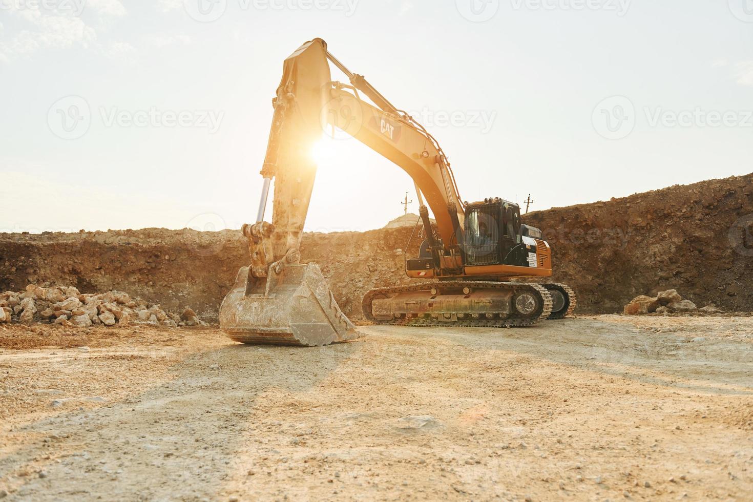 Loading vehicle is outdoors on the borrow pit at daytime photo