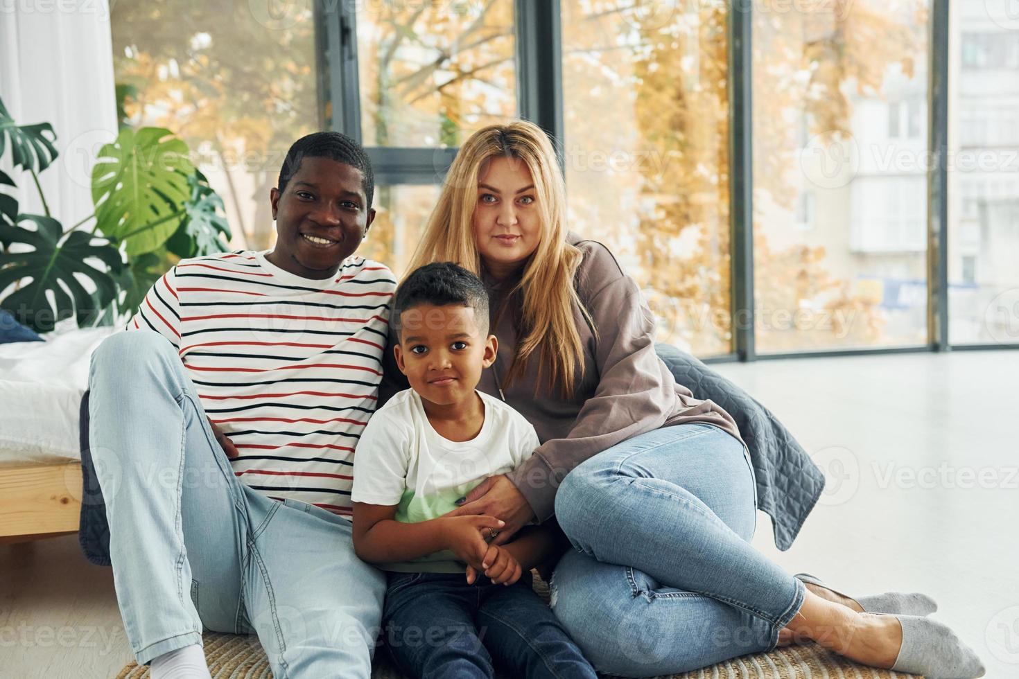 Mixed race family together photo