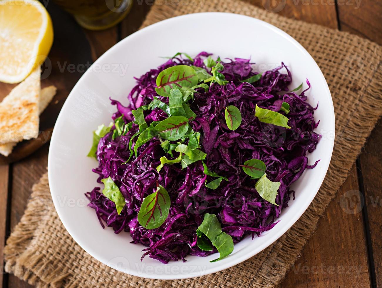 Salad of red cabbage with herbs photo