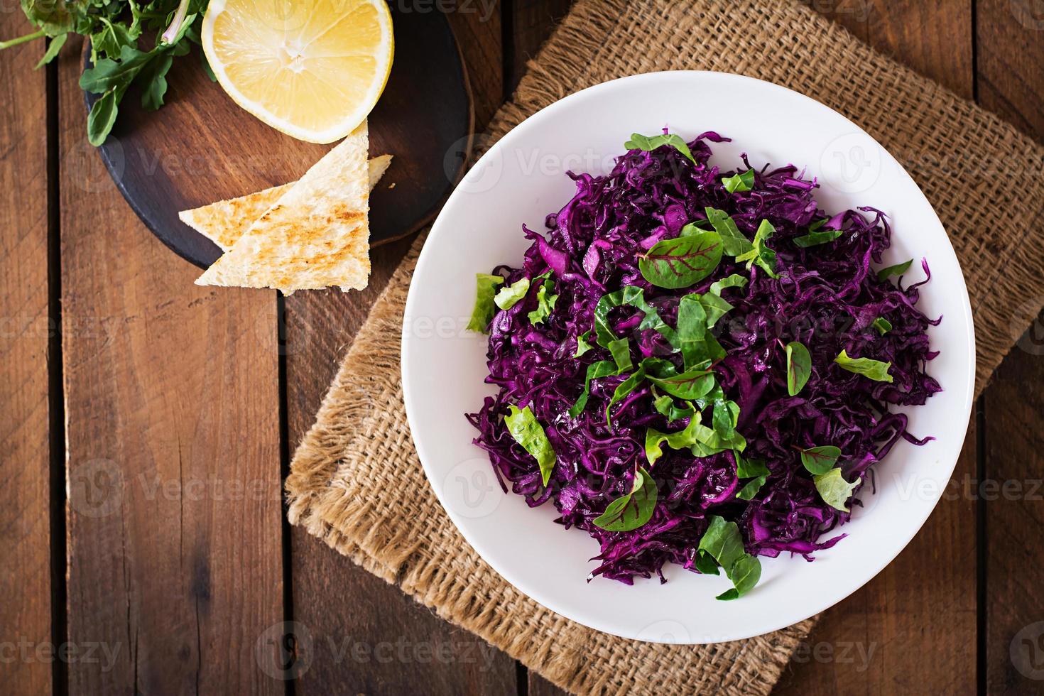 Salad of red cabbage with herbs photo
