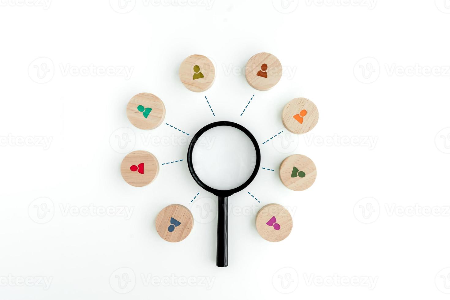 Magnifying glass looking for employees on wood cube and line connection. Find leader or new employee. Team communication. Teamwork. Human resources management and recruitment business hiring concept. photo