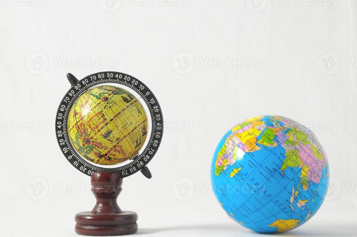 Isolated globes on white background photo