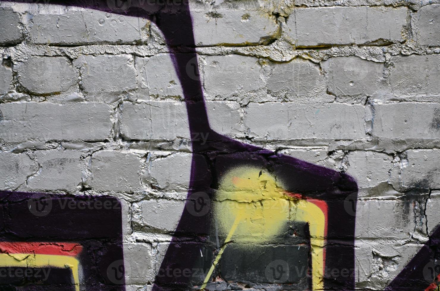 Background image of the wall decorated with colorful abstract graffiti. Street art concept photo
