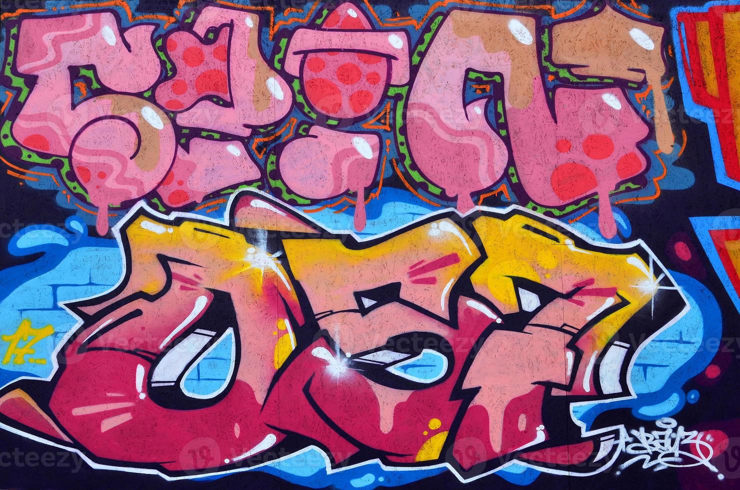 hermoso graffiti de arte callejero. color abstracto dibujo creativo colores de moda en las paredes de la ciudad. cultura contemporánea urbana. pintura de título en las paredes. cultura protesta juvenil foto